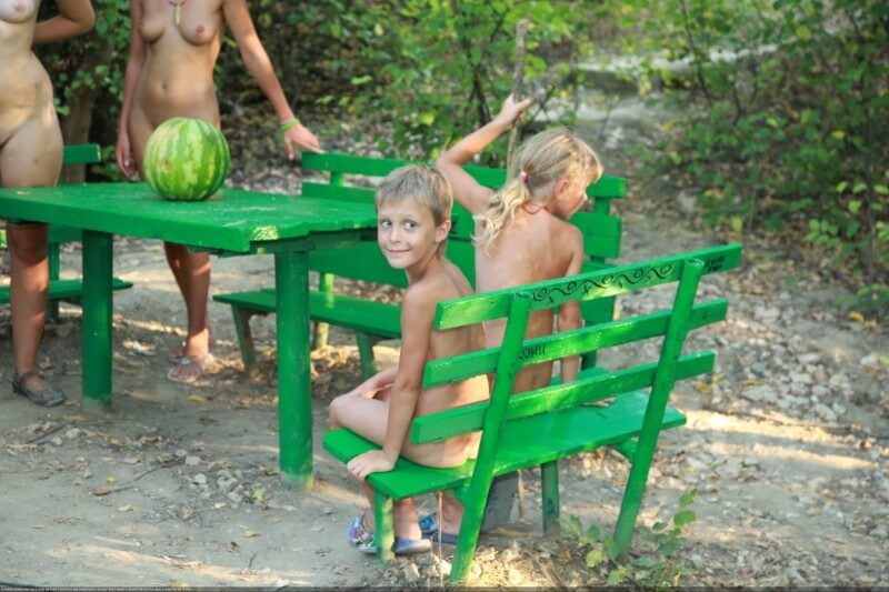 Naturists green picnic photos